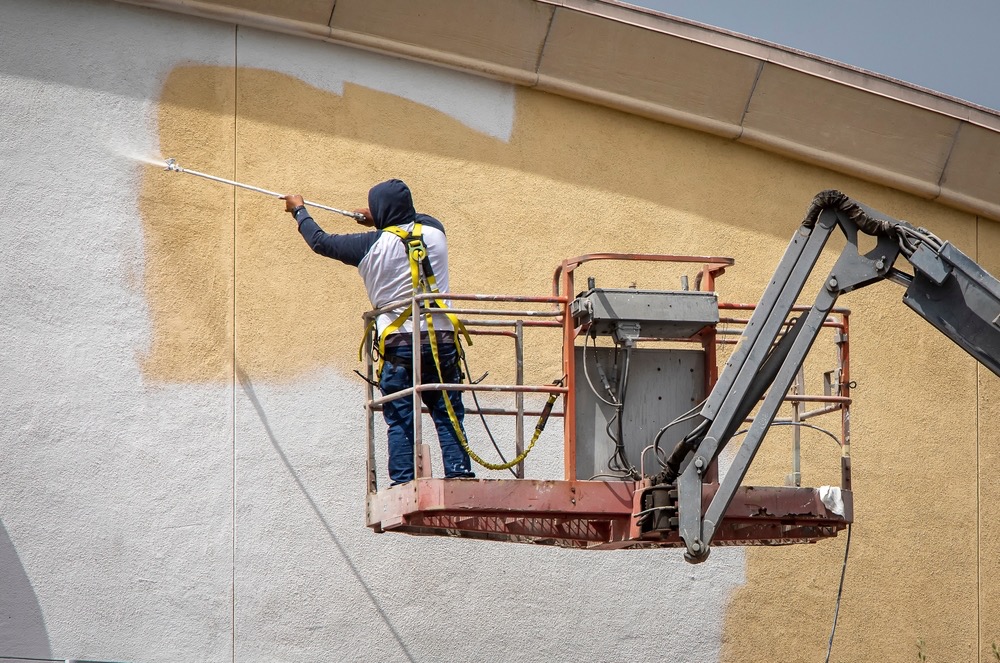 Industrial property renovation and rehab services - before and after metal building repair, painting, and landscaping